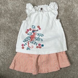 Tea sleeveless shirt with a seahorse & striped skort. Size 12-18 months.